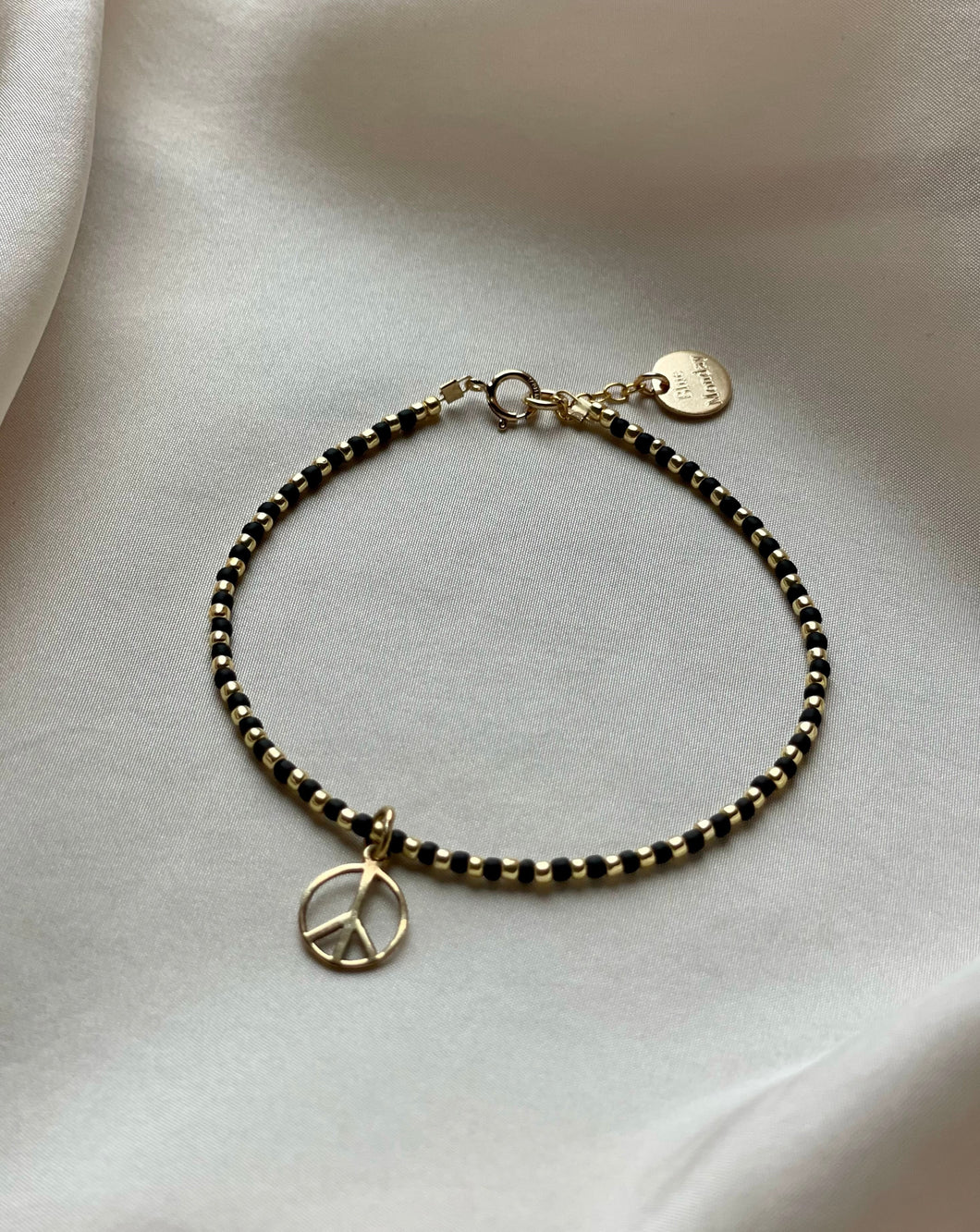 Peace out - Black and Gold bracelet