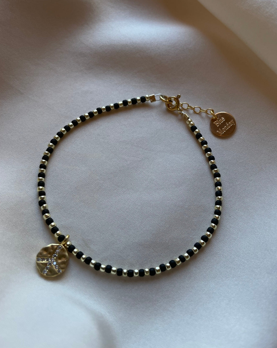 Peace out in gemstones - Black and Gold bracelet